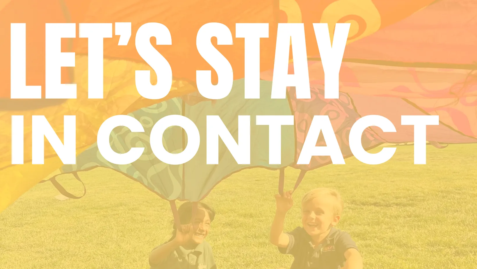 Children playing with a colorful parachute at a GECAC event - Let's stay in contact